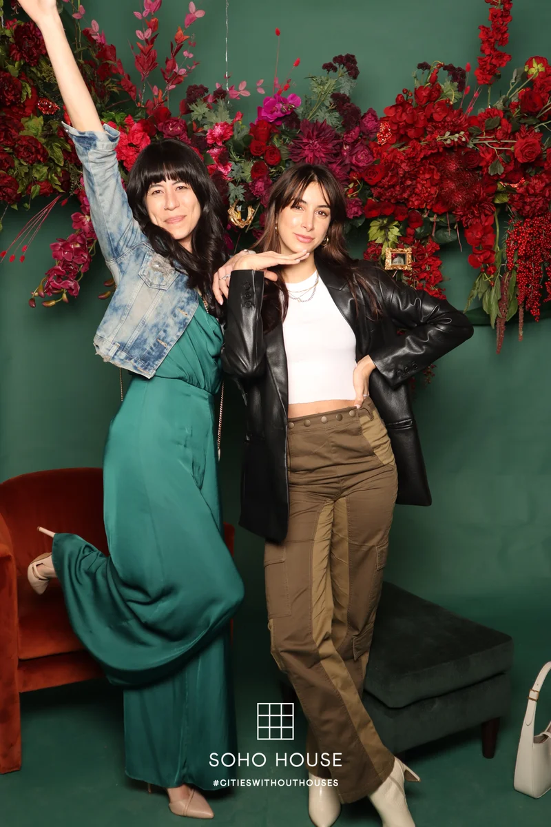 Friends posing at an OMG Booth experience